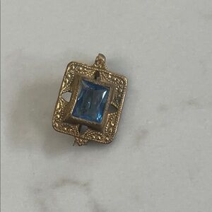 Elegant Gold and Blue Brooch